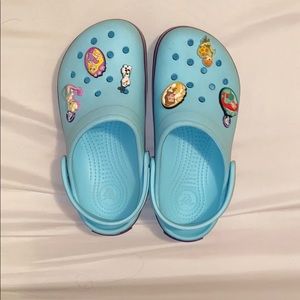 Baby blue and purple crocs
